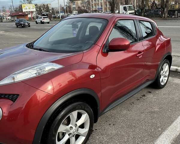 Красный Ниссан Жук, объемом двигателя 1.6 л и пробегом 117 тыс. км за 9900 $, фото 6 на Automoto.ua