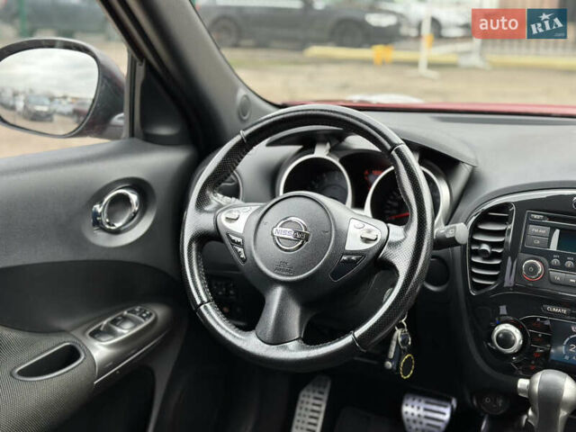 Красный Ниссан Жук, объемом двигателя 1.6 л и пробегом 130 тыс. км за 9999 $, фото 22 на Automoto.ua