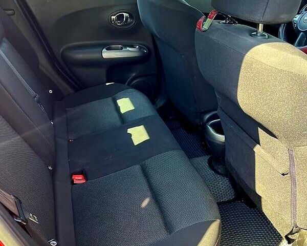 Червоний Ніссан Жук, об'ємом двигуна 1.6 л та пробігом 125 тис. км за 9700 $, фото 10 на Automoto.ua