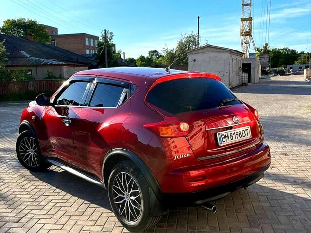 Красный Ниссан Жук, объемом двигателя 1.6 л и пробегом 95 тыс. км за 9300 $, фото 3 на Automoto.ua