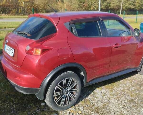 Червоний Ніссан Жук, об'ємом двигуна 1.6 л та пробігом 159 тис. км за 8900 $, фото 6 на Automoto.ua