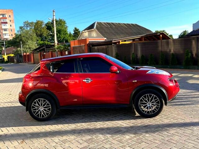 Красный Ниссан Жук, объемом двигателя 1.6 л и пробегом 95 тыс. км за 9300 $, фото 2 на Automoto.ua