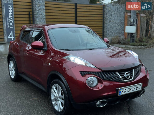 Червоний Ніссан Жук, об'ємом двигуна 1.6 л та пробігом 97 тис. км за 10750 $, фото 26 на Automoto.ua