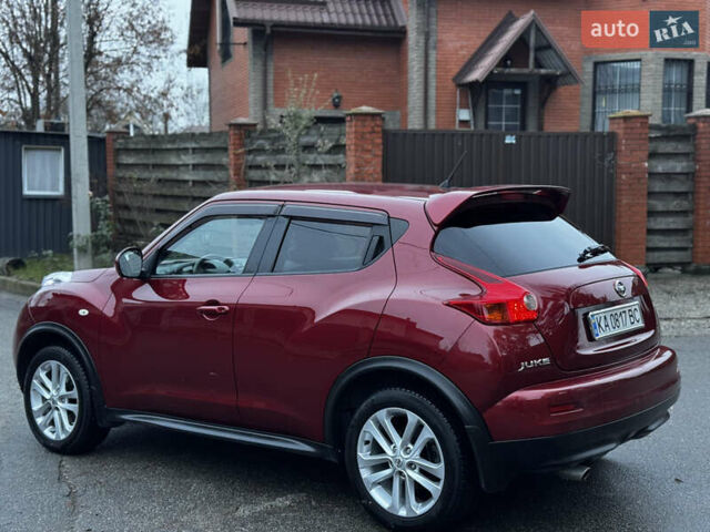 Червоний Ніссан Жук, об'ємом двигуна 1.6 л та пробігом 97 тис. км за 10750 $, фото 18 на Automoto.ua