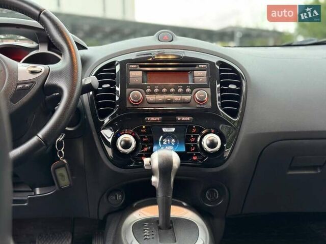 Червоний Ніссан Жук, об'ємом двигуна 1.6 л та пробігом 126 тис. км за 9200 $, фото 11 на Automoto.ua