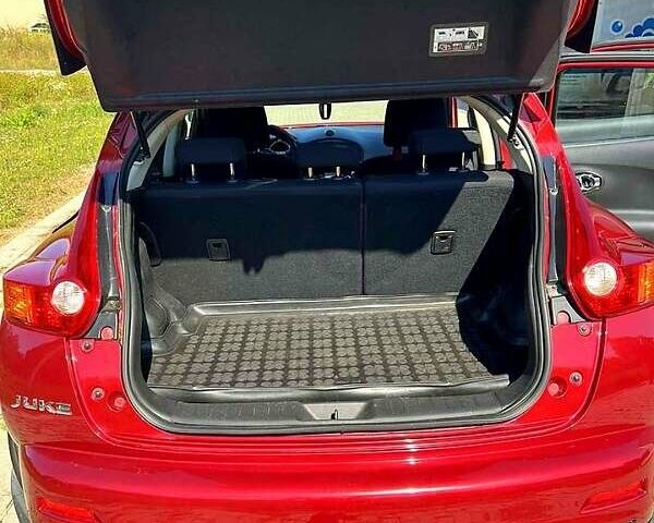 Червоний Ніссан Жук, об'ємом двигуна 1.6 л та пробігом 125 тис. км за 9700 $, фото 5 на Automoto.ua