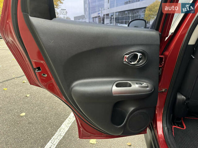 Красный Ниссан Жук, объемом двигателя 1.6 л и пробегом 130 тыс. км за 10500 $, фото 39 на Automoto.ua