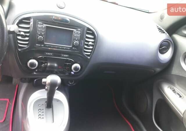 Червоний Ніссан Жук, об'ємом двигуна 1.6 л та пробігом 199 тис. км за 9700 $, фото 14 на Automoto.ua