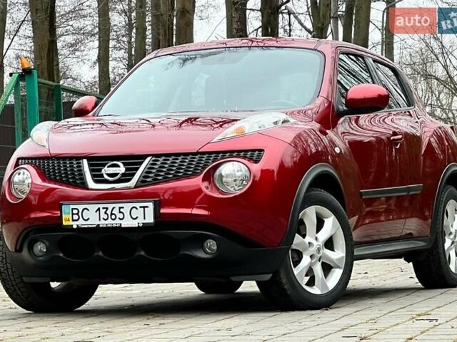 Червоний Ніссан Жук, об'ємом двигуна 1.6 л та пробігом 98 тис. км за 10999 $, фото 6 на Automoto.ua