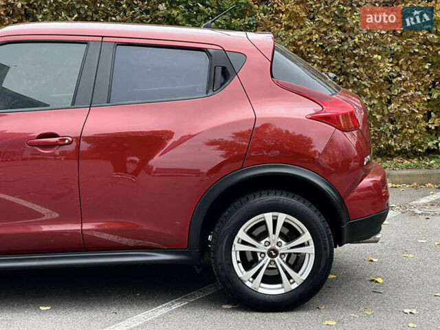 Красный Ниссан Жук, объемом двигателя 1.6 л и пробегом 130 тыс. км за 10500 $, фото 12 на Automoto.ua