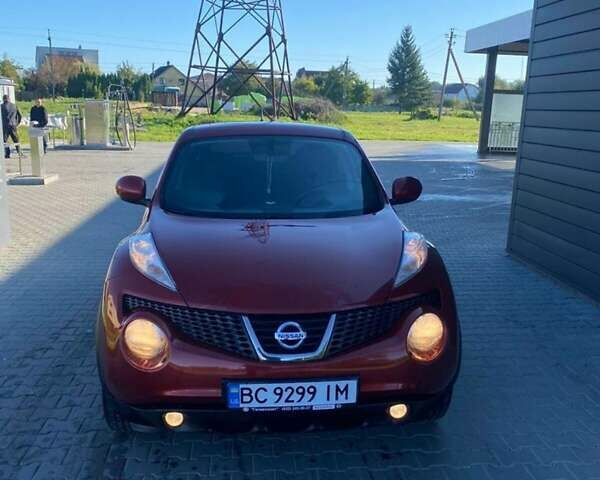 Червоний Ніссан Жук, об'ємом двигуна 1.6 л та пробігом 105 тис. км за 11450 $, фото 7 на Automoto.ua