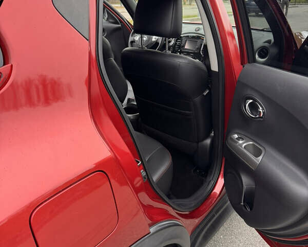 Червоний Ніссан Жук, об'ємом двигуна 1.6 л та пробігом 86 тис. км за 9999 $, фото 5 на Automoto.ua