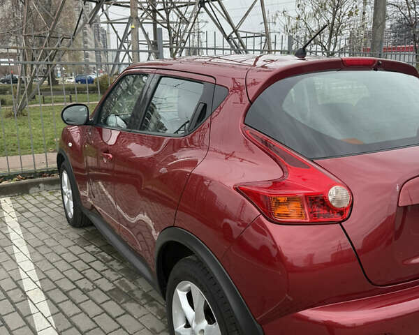 Червоний Ніссан Жук, об'ємом двигуна 1.6 л та пробігом 166 тис. км за 9600 $, фото 4 на Automoto.ua