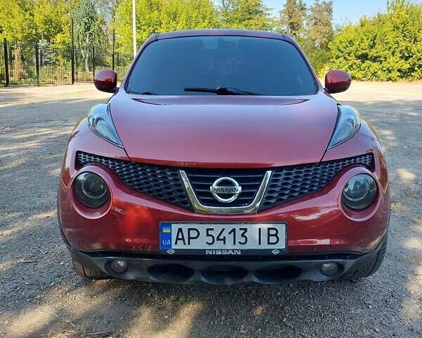 Красный Ниссан Жук, объемом двигателя 1.62 л и пробегом 135 тыс. км за 10000 $, фото 2 на Automoto.ua