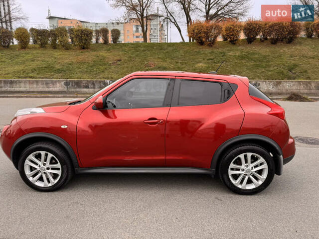 Червоний Ніссан Жук, об'ємом двигуна 1.6 л та пробігом 86 тис. км за 9999 $, фото 10 на Automoto.ua