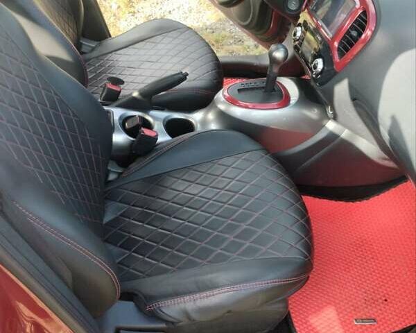 Червоний Ніссан Жук, об'ємом двигуна 1.6 л та пробігом 159 тис. км за 8900 $, фото 11 на Automoto.ua