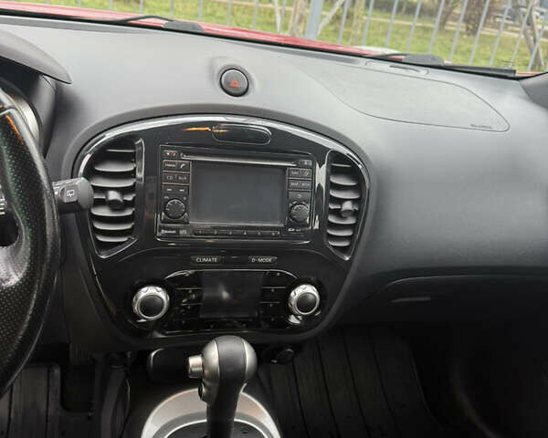 Червоний Ніссан Жук, об'ємом двигуна 1.6 л та пробігом 166 тис. км за 9600 $, фото 7 на Automoto.ua