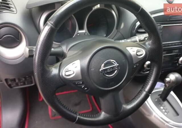 Червоний Ніссан Жук, об'ємом двигуна 1.6 л та пробігом 199 тис. км за 9700 $, фото 19 на Automoto.ua