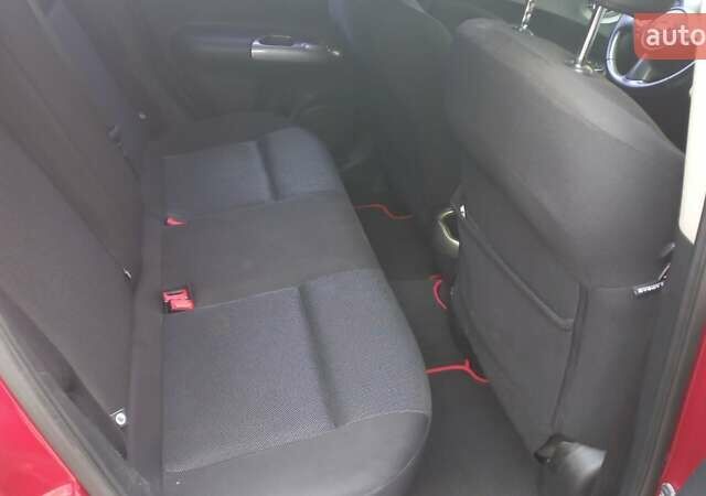 Червоний Ніссан Жук, об'ємом двигуна 1.6 л та пробігом 199 тис. км за 9700 $, фото 12 на Automoto.ua