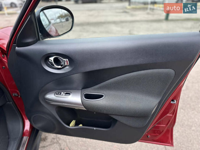 Красный Ниссан Жук, объемом двигателя 1.6 л и пробегом 130 тыс. км за 9999 $, фото 25 на Automoto.ua