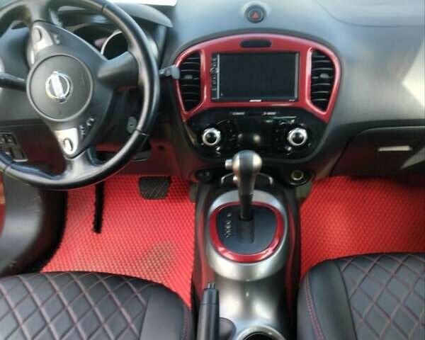 Червоний Ніссан Жук, об'ємом двигуна 1.6 л та пробігом 159 тис. км за 8900 $, фото 3 на Automoto.ua