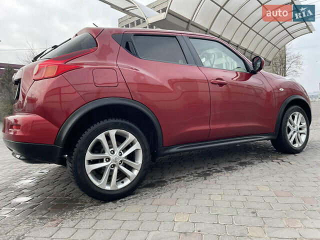 Красный Ниссан Жук, объемом двигателя 1.6 л и пробегом 147 тыс. км за 10500 $, фото 4 на Automoto.ua