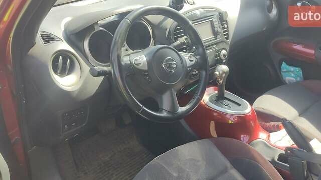 Красный Ниссан Жук, объемом двигателя 1.6 л и пробегом 175 тыс. км за 11000 $, фото 2 на Automoto.ua