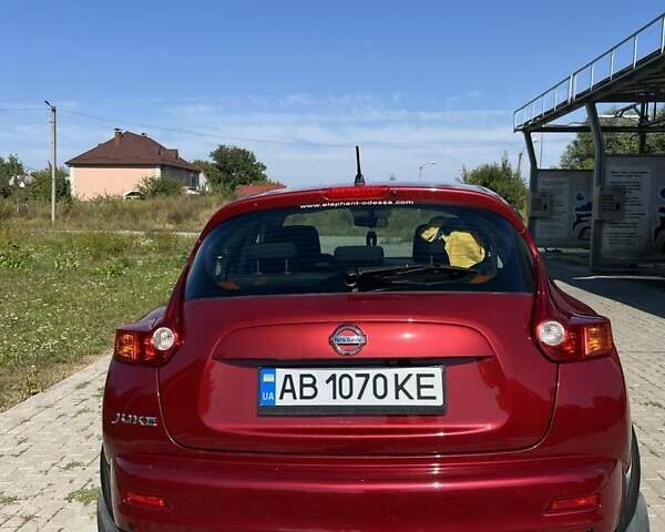 Красный Ниссан Жук, объемом двигателя 1.6 л и пробегом 125 тыс. км за 9700 $, фото 7 на Automoto.ua