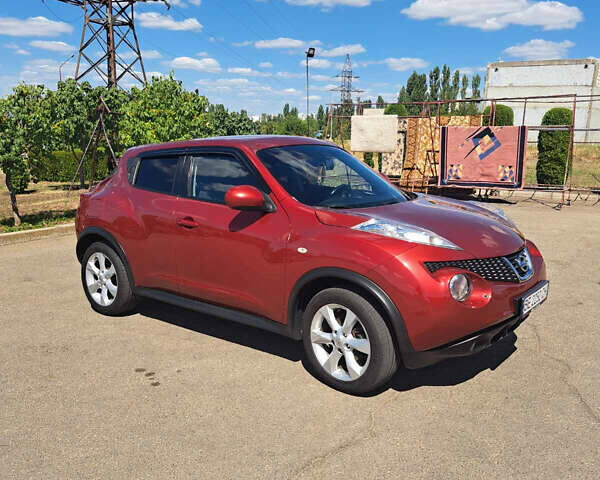 Красный Ниссан Жук, объемом двигателя 1.6 л и пробегом 162 тыс. км за 10400 $, фото 1 на Automoto.ua