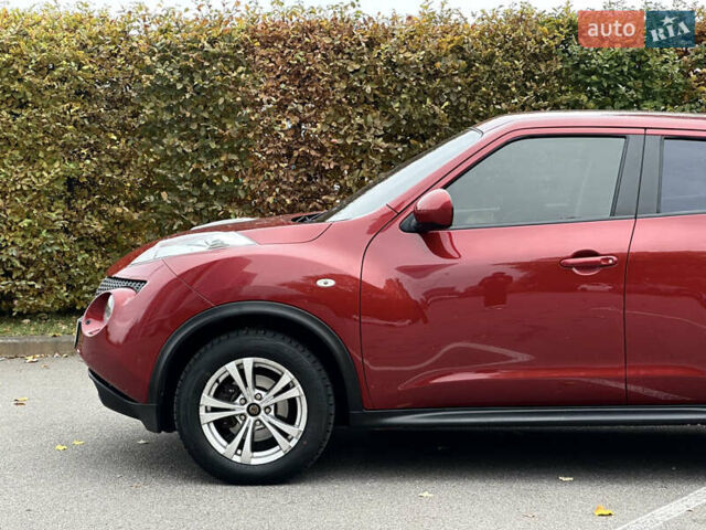 Красный Ниссан Жук, объемом двигателя 1.6 л и пробегом 130 тыс. км за 10500 $, фото 11 на Automoto.ua