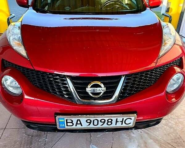 Красный Ниссан Жук, объемом двигателя 1.6 л и пробегом 150 тыс. км за 10200 $, фото 1 на Automoto.ua
