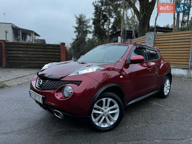 Червоний Ніссан Жук, об'ємом двигуна 1.6 л та пробігом 97 тис. км за 10750 $, фото 5 на Automoto.ua