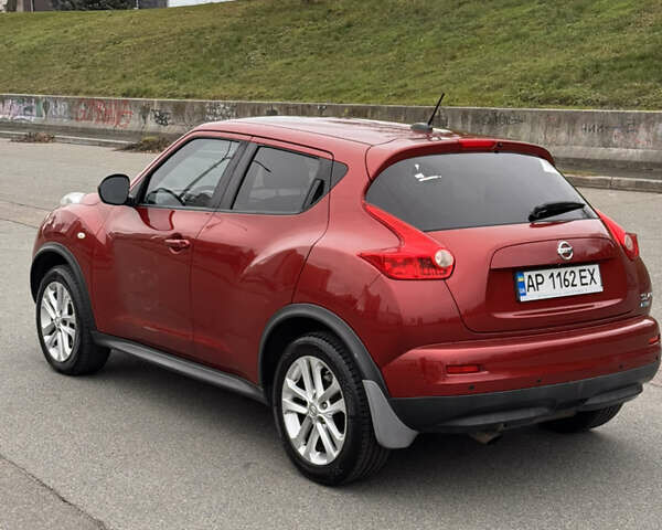 Червоний Ніссан Жук, об'ємом двигуна 1.6 л та пробігом 86 тис. км за 9999 $, фото 8 на Automoto.ua