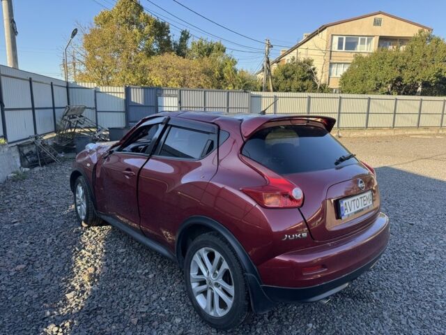 Червоний Ніссан Жук, об'ємом двигуна 1.6 л та пробігом 83 тис. км за 4600 $, фото 4 на Automoto.ua