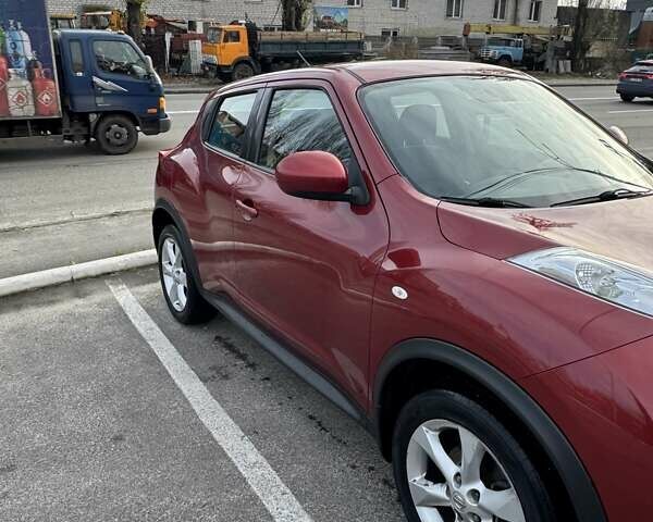 Красный Ниссан Жук, объемом двигателя 1.6 л и пробегом 117 тыс. км за 9900 $, фото 7 на Automoto.ua