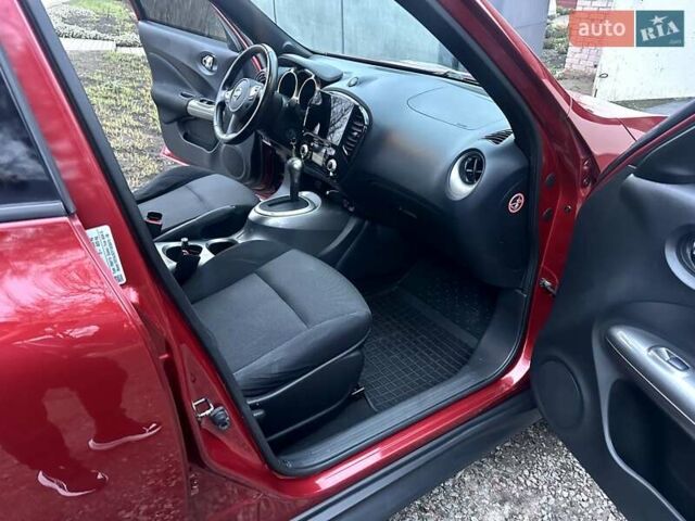 Червоний Ніссан Жук, об'ємом двигуна 1.6 л та пробігом 147 тис. км за 9999 $, фото 29 на Automoto.ua