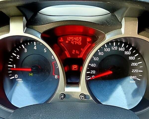 Червоний Ніссан Жук, об'ємом двигуна 1.6 л та пробігом 125 тис. км за 9700 $, фото 9 на Automoto.ua