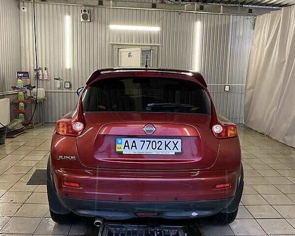 Червоний Ніссан Жук, об'ємом двигуна 1.6 л та пробігом 143 тис. км за 9800 $, фото 7 на Automoto.ua