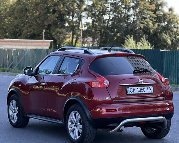 Красный Ниссан Жук, объемом двигателя 1.6 л и пробегом 198 тыс. км за 8300 $, фото 10 на Automoto.ua