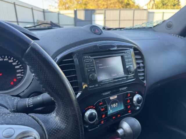 Червоний Ніссан Жук, об'ємом двигуна 1.6 л та пробігом 83 тис. км за 4600 $, фото 6 на Automoto.ua