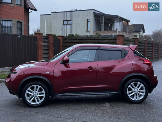 Червоний Ніссан Жук, об'ємом двигуна 1.6 л та пробігом 97 тис. км за 10750 $, фото 16 на Automoto.ua
