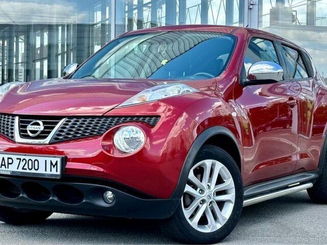 Красный Ниссан Жук, объемом двигателя 1.6 л и пробегом 123 тыс. км за 9000 $, фото 1 на Automoto.ua