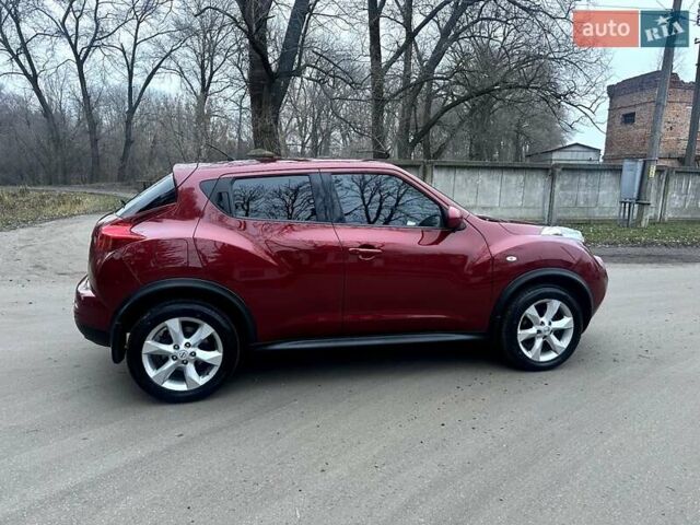 Червоний Ніссан Жук, об'ємом двигуна 1.6 л та пробігом 147 тис. км за 9999 $, фото 5 на Automoto.ua