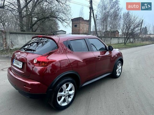 Червоний Ніссан Жук, об'ємом двигуна 1.6 л та пробігом 147 тис. км за 9999 $, фото 7 на Automoto.ua