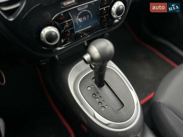 Красный Ниссан Жук, объемом двигателя 1.6 л и пробегом 130 тыс. км за 10500 $, фото 27 на Automoto.ua