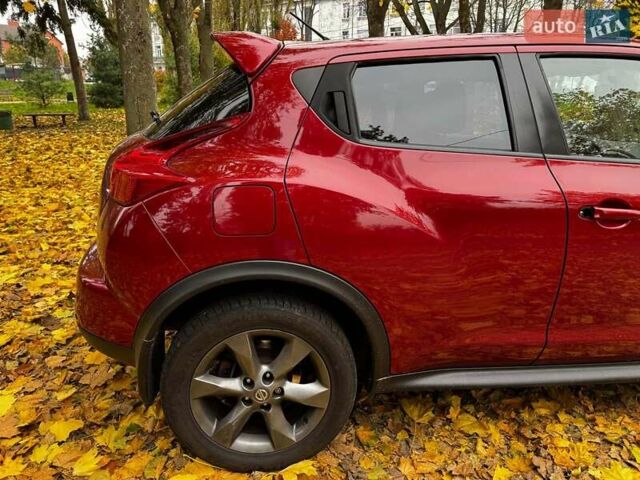 Красный Ниссан Жук, объемом двигателя 1.6 л и пробегом 131 тыс. км за 9990 $, фото 4 на Automoto.ua