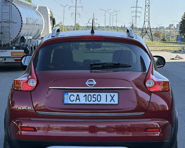 Красный Ниссан Жук, объемом двигателя 1.6 л и пробегом 198 тыс. км за 8300 $, фото 9 на Automoto.ua