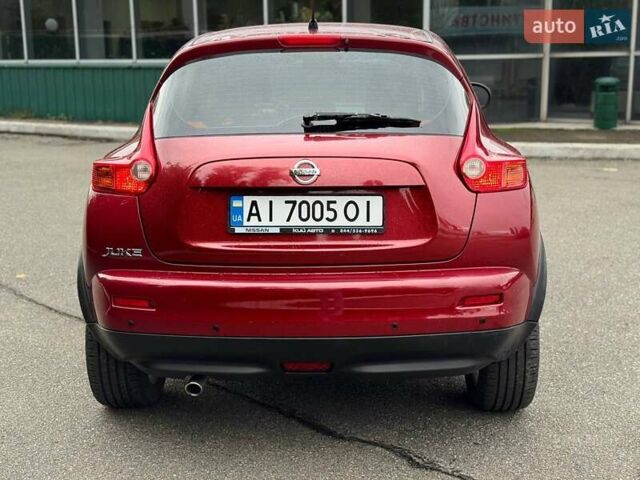 Червоний Ніссан Жук, об'ємом двигуна 1.6 л та пробігом 126 тис. км за 9200 $, фото 5 на Automoto.ua