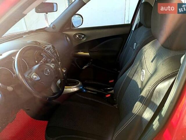 Красный Ниссан Жук, объемом двигателя 1.6 л и пробегом 150 тыс. км за 10200 $, фото 5 на Automoto.ua