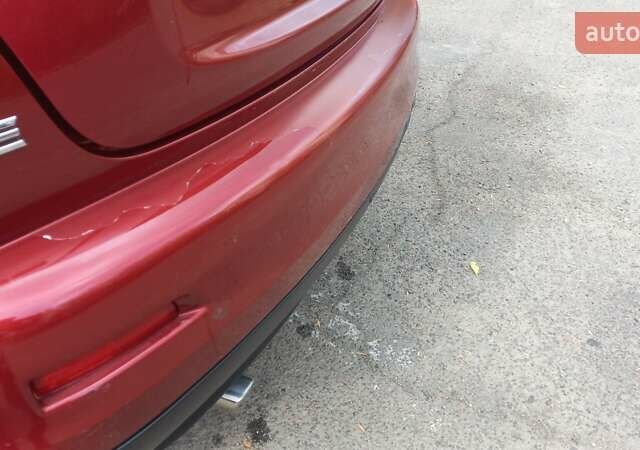 Червоний Ніссан Жук, об'ємом двигуна 1.6 л та пробігом 199 тис. км за 9700 $, фото 2 на Automoto.ua